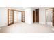 Spacious main bedroom with neutral walls, plush carpet, and ensuite bathroom at 655 Cree Cir, Boulder, CO 80303