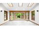 A sunroom boasting large windows, skylights, neutral paint, and tile flooring at 655 Cree Cir, Boulder, CO 80303