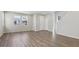 Spacious living room with natural light and attractive floors at 7245 Goldbloom Ln, Littleton, CO 80125