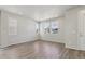 Bright and spacious living room area boasting gleaming floors and lots of natural light at 7245 Goldbloom Ln, Littleton, CO 80125
