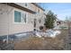 Inviting backyard featuring a stone patio, seating area, and gravel landscaping, perfect for outdoor living at 3378 Shoveler Trl, Castle Rock, CO 80104