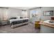 Cozy bedroom with neutral walls, carpet, a bright window with views, and a comfortable bed at 3378 Shoveler Trl, Castle Rock, CO 80104