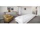 Bright bedroom with a comfy bed, a stylish dresser, and a doorway leading to the ensuite at 3378 Shoveler Trl, Castle Rock, CO 80104