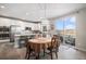 Elegant dining area next to the kitchen with sliding door access at 3378 Shoveler Trl, Castle Rock, CO 80104