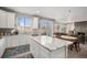Bright, modern kitchen with granite countertops and an open floor plan at 3378 Shoveler Trl, Castle Rock, CO 80104