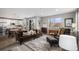 Spacious living room with lots of natural light and a cozy fireplace at 3378 Shoveler Trl, Castle Rock, CO 80104