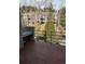 Balcony with wood floors and scenic wooded views, perfect for relaxation at 748 Ridgeside Dr, Golden, CO 80401