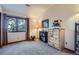 An inviting bedroom features a dresser, a window view, and cozy decor at 748 Ridgeside Dr, Golden, CO 80401