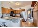 Kitchen with granite countertops, stainless steel appliances, and wooden cabinets at 748 Ridgeside Dr, Golden, CO 80401