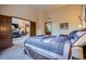 Spacious main bedroom with neutral walls, carpet and an open doorway into other living areas at 748 Ridgeside Dr, Golden, CO 80401