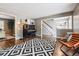 Stylish living room with wood floors, neutral walls, a large window, and trendy furnishings at 7359 S Jay St, Littleton, CO 80128