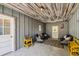 Stylish covered patio with modern decor, providing an inviting space for relaxation and entertainment at 7359 S Jay St, Littleton, CO 80128