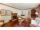 Charming living room featuring a fireplace, hardwood floors, and classic decor at 2309 E Floyd Pl, Englewood, CO 80113