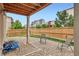 Backyard with gravel and partially covered patio at 2592 Sweet Wind Ave, Castle Rock, CO 80109