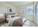 Cozy bedroom features neutral tones, stylish decor, and plenty of natural light at 14144 Bunny Hop Ln, Parker, CO 80134