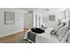 Spacious main bedroom showcasing hardwood floors, a king-sized bed and ample closet space at 3884 S Niagara Way, Denver, CO 80237
