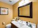 Charming bathroom with stylish fixtures, a large mirror, and a clean, bright ambiance at 1265 Niagara St, Denver, CO 80220