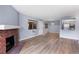 Inviting living space with brick fireplace, large windows, and open layout, ideal for entertaining at 14602 E 2Nd Ave # 204C, Aurora, CO 80011