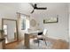 Bright office with hardwood floors and large windows at 1411 S Beach Ct, Denver, CO 80219