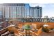 Balcony with brick surround featuring glass table and seating at 930 Acoma St # 420, Denver, CO 80204