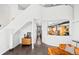 Hallway featuring a peek into a modern kitchen with stainless steel appliances and ample counter space at 930 Acoma St # 420, Denver, CO 80204