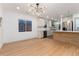 Bright kitchen featuring hardwood floors, recessed lighting, island and window at 475 S Race St, Denver, CO 80209