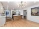 Modern kitchen featuring an island and stainless steel appliances with hardwood floors at 475 S Race St, Denver, CO 80209