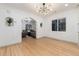 Bright living room featuring hardwood floors, recessed lighting, and arched doorways at 475 S Race St, Denver, CO 80209