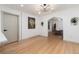 Bright living room featuring hardwood floors, recessed lighting, and arched doorways at 475 S Race St, Denver, CO 80209