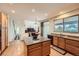 Well-equipped kitchen with granite countertops, stainless appliances, ample cabinet space and kitchen island at 17456 Quarry Way, Monument, CO 80132