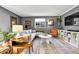 Cozy living room with light gray sofa, artwork, and ample natural light at 85 N Ogden St # 13, Denver, CO 80218