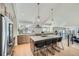 Modern kitchen featuring stainless steel appliances and a large island at 2133 S Parfet Dr, Lakewood, CO 80227