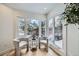 Cozy sitting area with two armchairs and plenty of natural light at 2133 S Parfet Dr, Lakewood, CO 80227