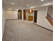 Spacious finished basement with new carpet, kitchenette, and ample room for recreation and entertaining at 2477 S Oakland Cir, Aurora, CO 80014