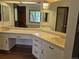 Vanity with double sinks and ample counter space offers room for getting ready in the primary bathroom at 2477 S Oakland Cir, Aurora, CO 80014