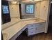 Vanity with double sinks and ample counter space offers room for getting ready in the primary bathroom at 2477 S Oakland Cir, Aurora, CO 80014