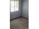 Compact bedroom featuring a window at 2477 S Oakland Cir, Aurora, CO 80014