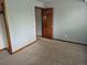 Cozy bedroom with carpet and blue walls at 2477 S Oakland Cir, Aurora, CO 80014