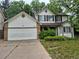 Charming two-story home featuring a two-car garage and mature trees in a Gathering-friendly neighborhood at 2477 S Oakland Cir, Aurora, CO 80014