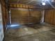 Spacious two-car garage offering ample storage and parking space with an unfinished interior at 2477 S Oakland Cir, Aurora, CO 80014