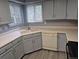 Kitchen with stainless steel faucet, lots of counter space and light blue cabinets at 2477 S Oakland Cir, Aurora, CO 80014