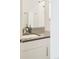 The bathroom has a modern vanity with stylish faucet, and decorative mosaic backsplash at 928 Cimarron Dr # C, Lafayette, CO 80026