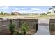 Fenced front yard providing a private outdoor space with minimal landscaping, offering views of surrounding neighborhood at 928 Cimarron Dr # C, Lafayette, CO 80026