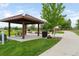Shaded picnic area with tables and grills for outdoor gatherings at 928 Cimarron Dr # C, Lafayette, CO 80026