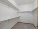 An organized walk-in closet with shelving and rod, providing ample storage space at 7254 S Kellerman Way, Aurora, CO 80016