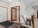 A view of the entryway featuring tiled flooring and doors leading to multiple rooms in the home at 7254 S Kellerman Way, Aurora, CO 80016