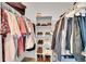 Organized walk-in closet with clothing racks and shoe shelves at 7064 E 2Nd Ave, Denver, CO 80220