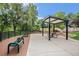 Community play area featuring benches, a picnic table under a gazebo, and a rock climbing structure at 3580 W 62Nd Pl, Denver, CO 80221