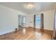 Bright living room with hardwood floors and French doors at 3637 Lowell Blvd, Denver, CO 80211