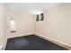 Cozy bedroom with carpet, window and neutral color walls at 4555 S Lowell Blvd, Denver, CO 80236